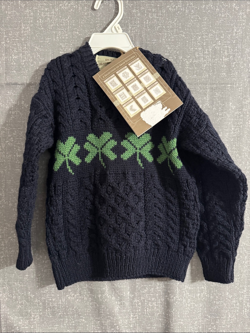 Navy Cable Knit Sweater with Green Clover Pattern